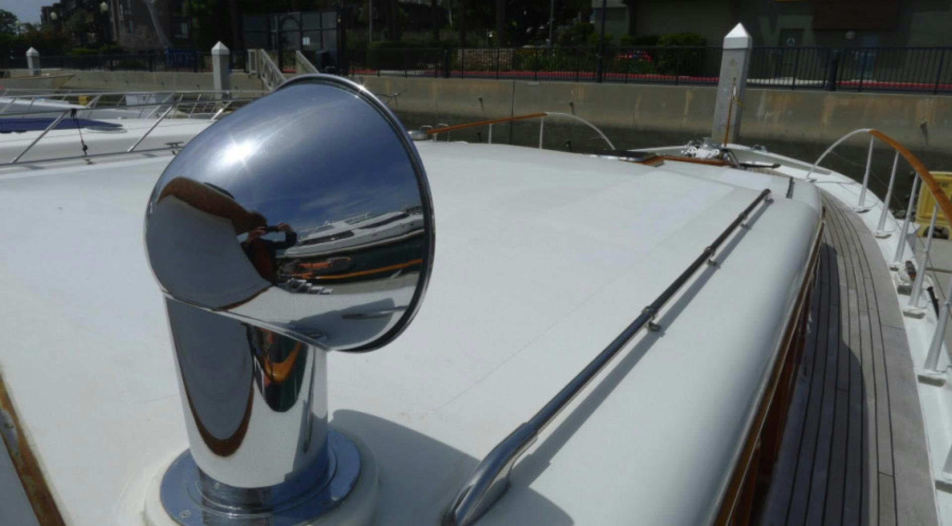 a white and blue car aboard DAKOTA Yacht for Sale