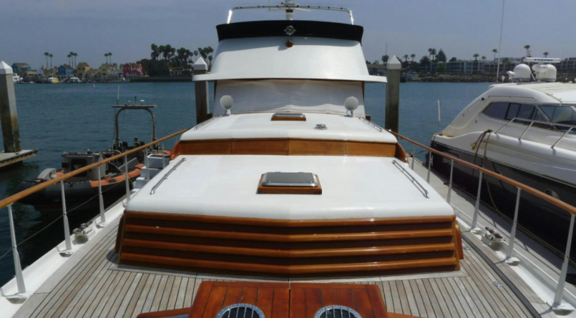a boat docked at a pier aboard DAKOTA Yacht for Sale