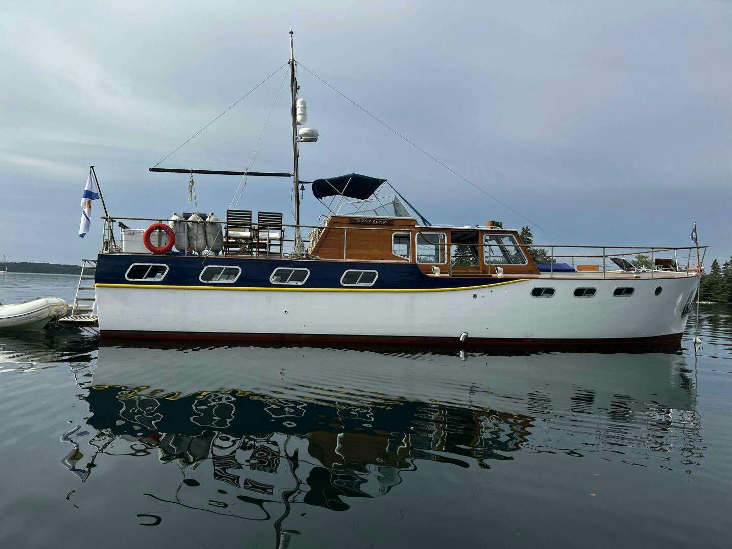 a boat is parked in the water aboard WILD GOOSE Yacht for Sale