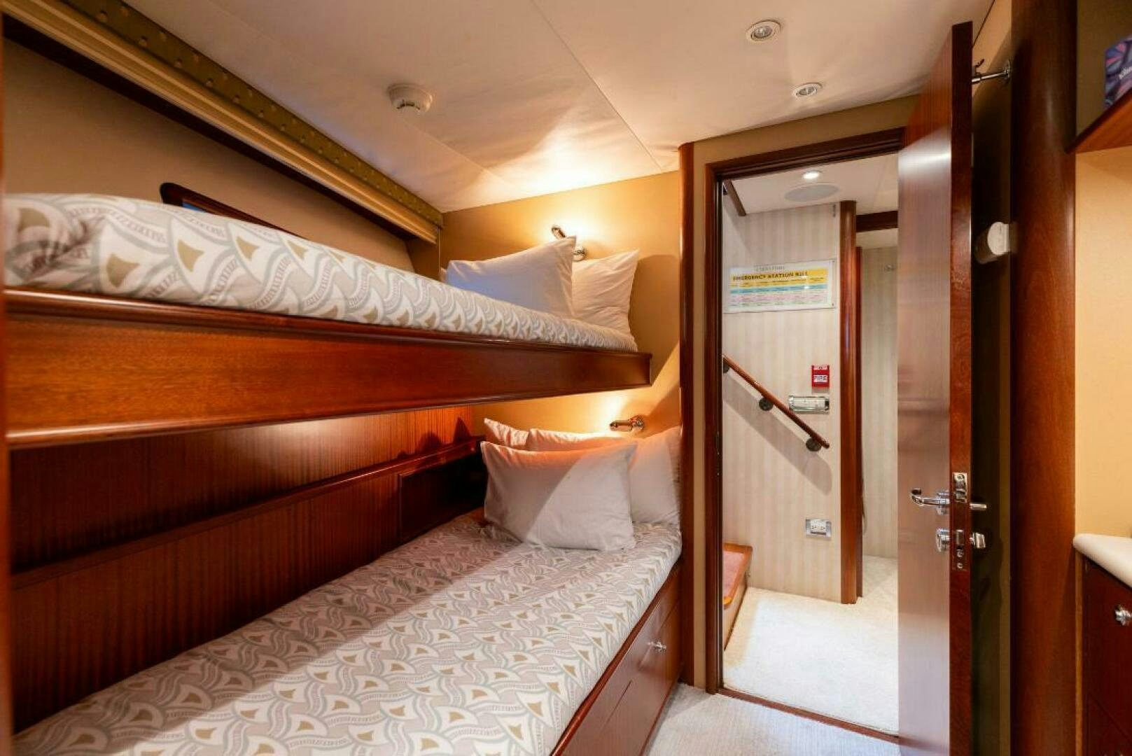 a bedroom with a double bed aboard STARLIGHT Yacht for Sale