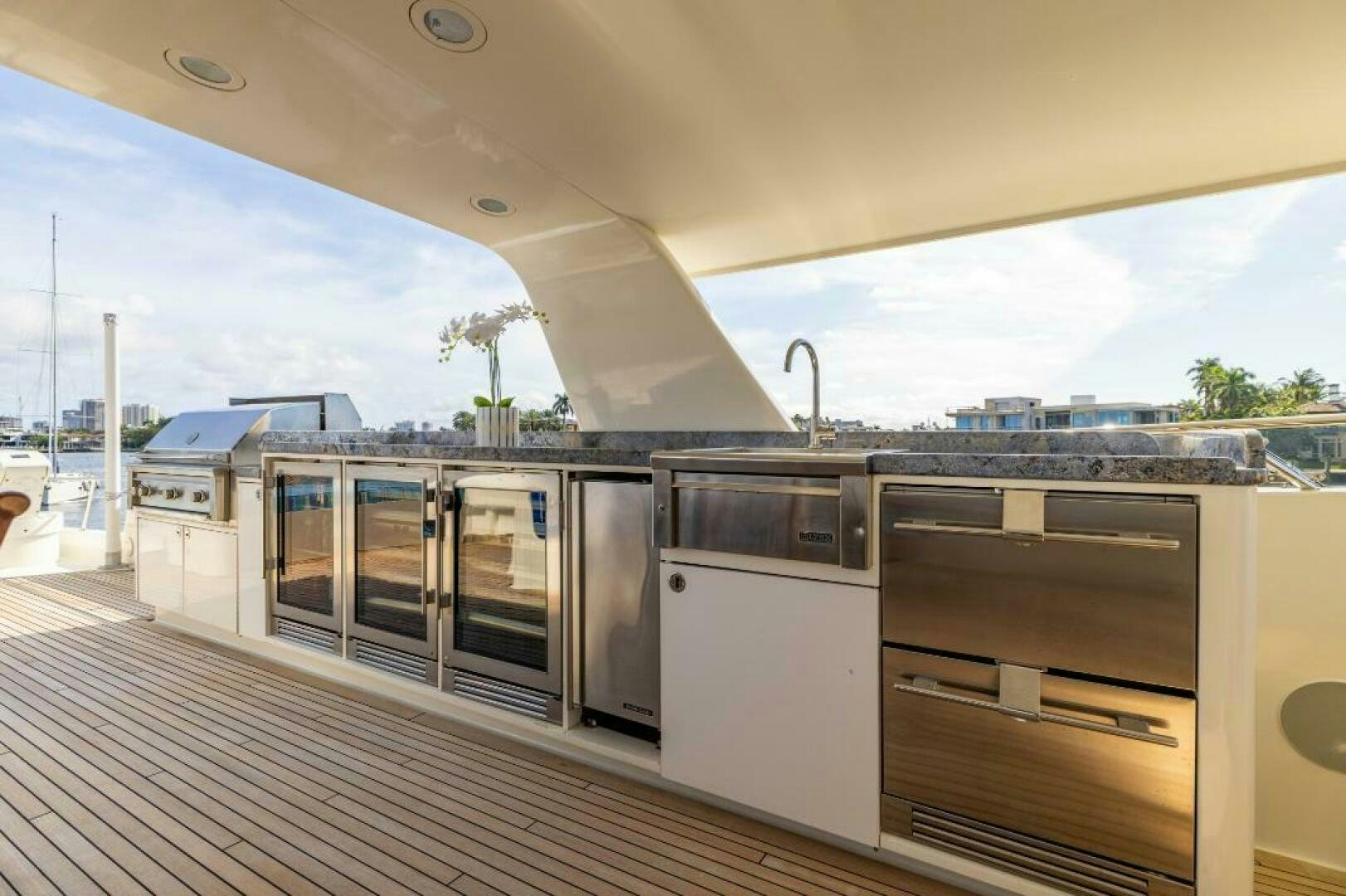 a large room with many open doors aboard STARLIGHT Yacht for Sale