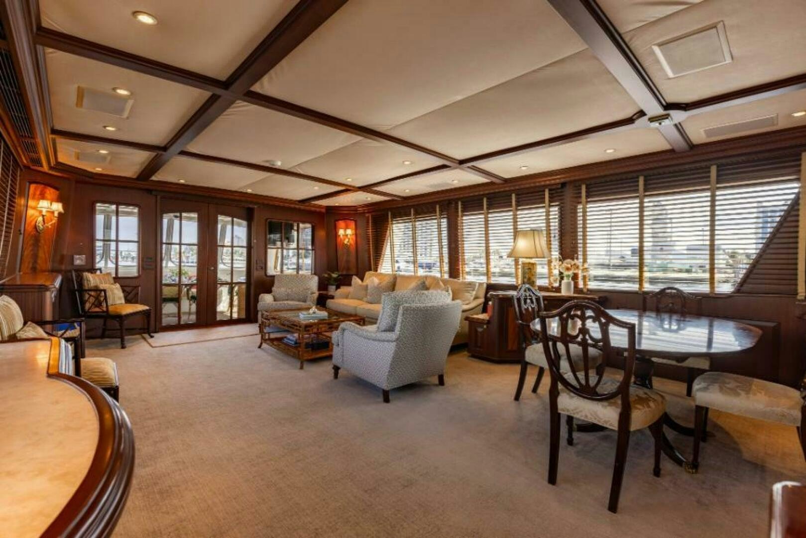 a large living room with a large open floor plan aboard STARLIGHT Yacht for Sale
