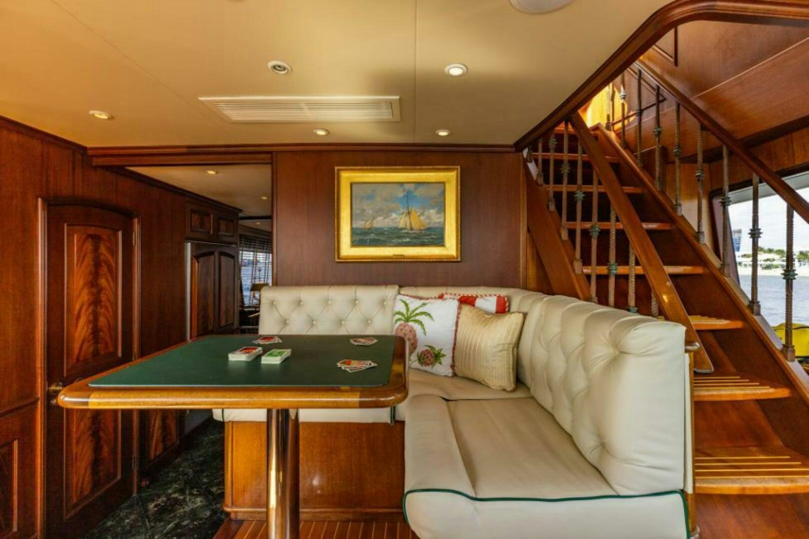 a living room with a couch and a table aboard STARLIGHT Yacht for Sale