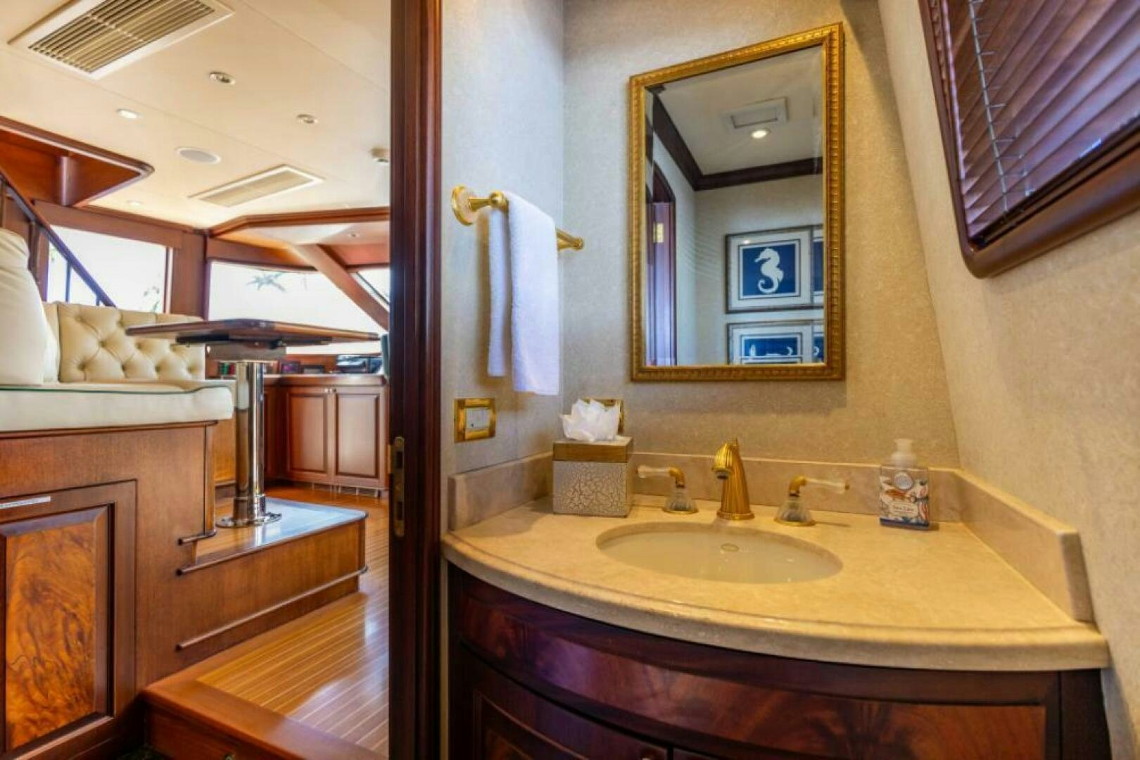 a bathroom with a sink and a mirror aboard STARLIGHT Yacht for Sale