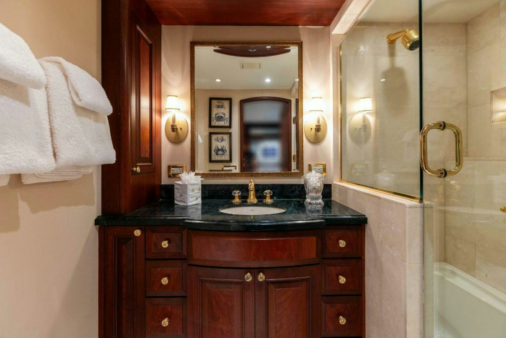 a bathroom with a sink and a mirror aboard STARLIGHT Yacht for Sale