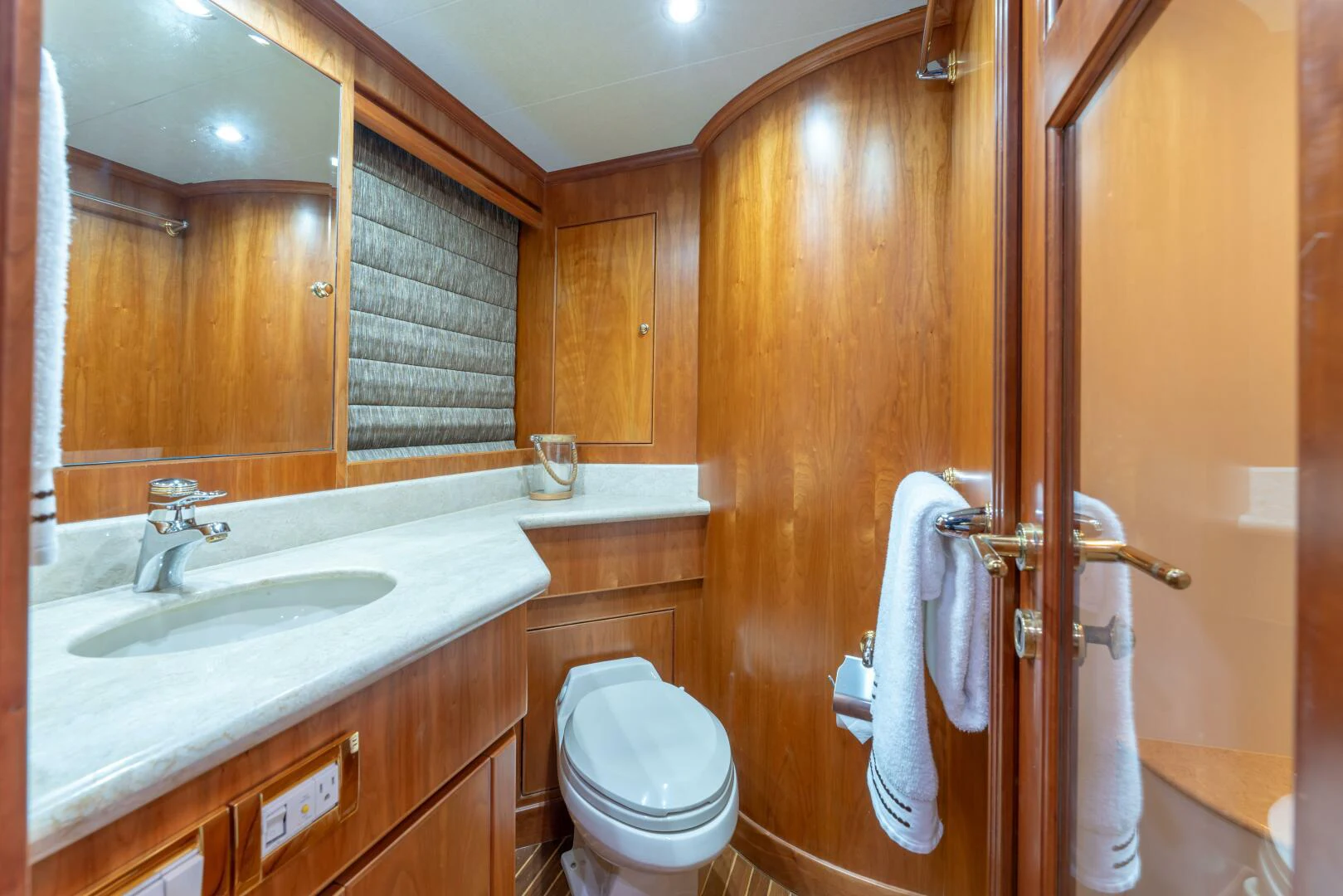 a bathroom with a sink and toilet aboard UN WINE Yacht for Sale