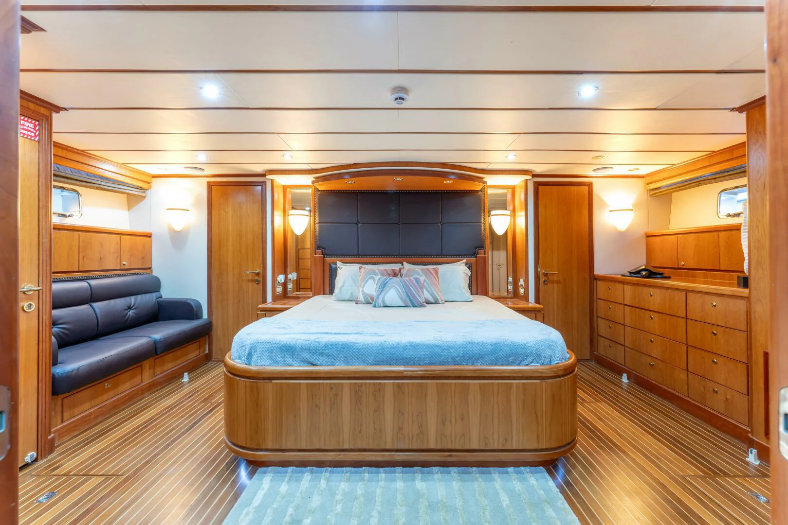 a bed in a room aboard UN WINE Yacht for Sale
