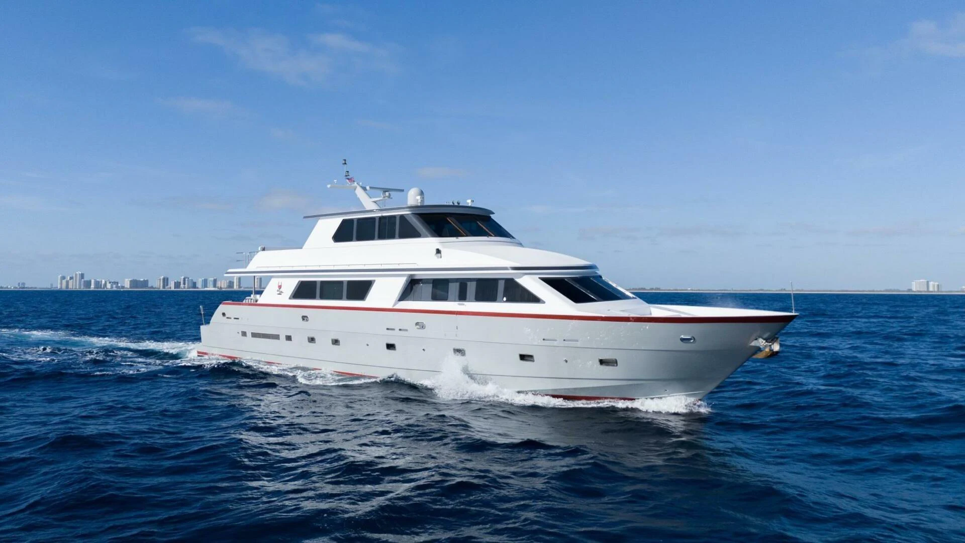 a white boat in the water aboard UN WINE Yacht for Sale