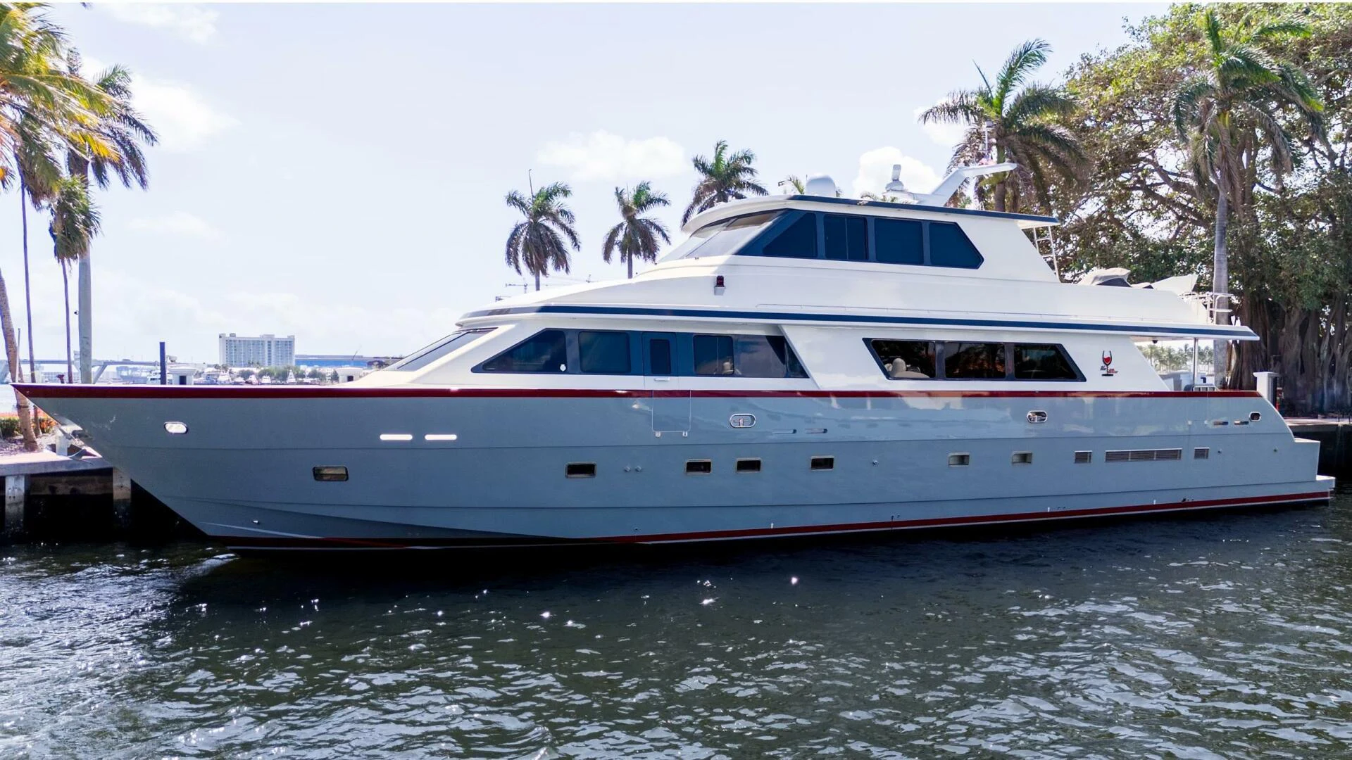a large white boat on the water aboard UN WINE Yacht for Sale