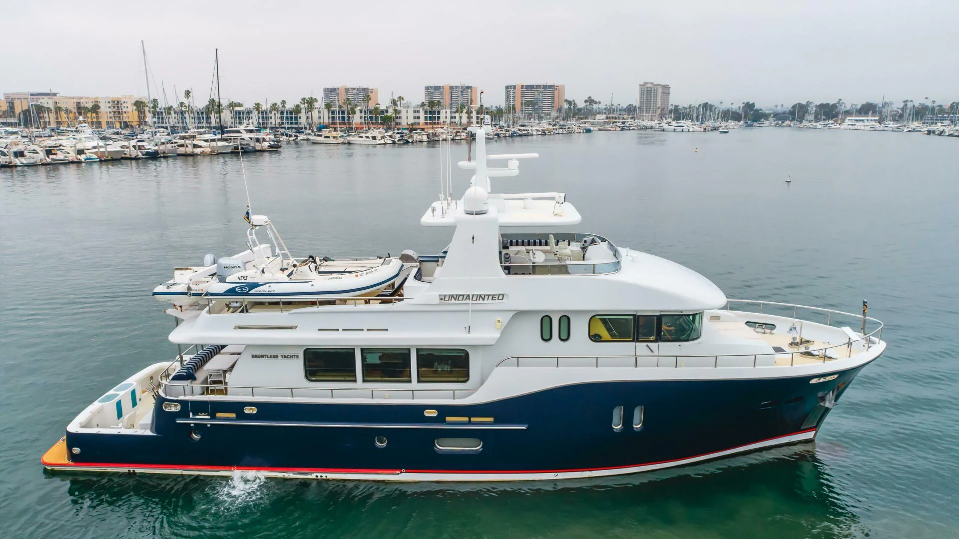 a boat in the water aboard UNDAUNTED Yacht for Sale