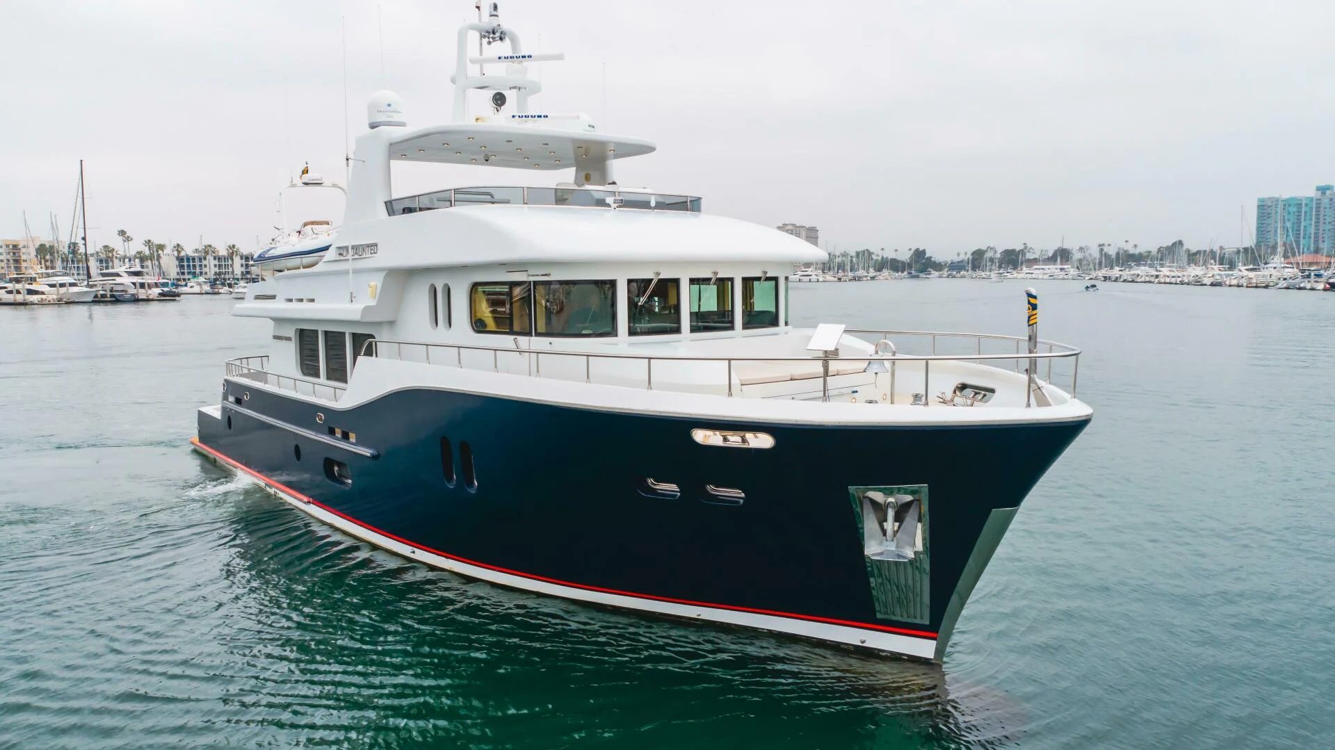 a boat in the water aboard UNDAUNTED Yacht for Sale