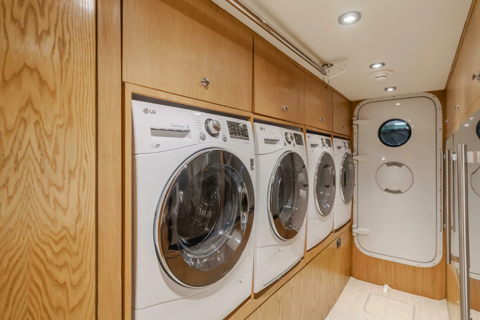 a row of washing machines aboard UNDAUNTED Yacht for Sale