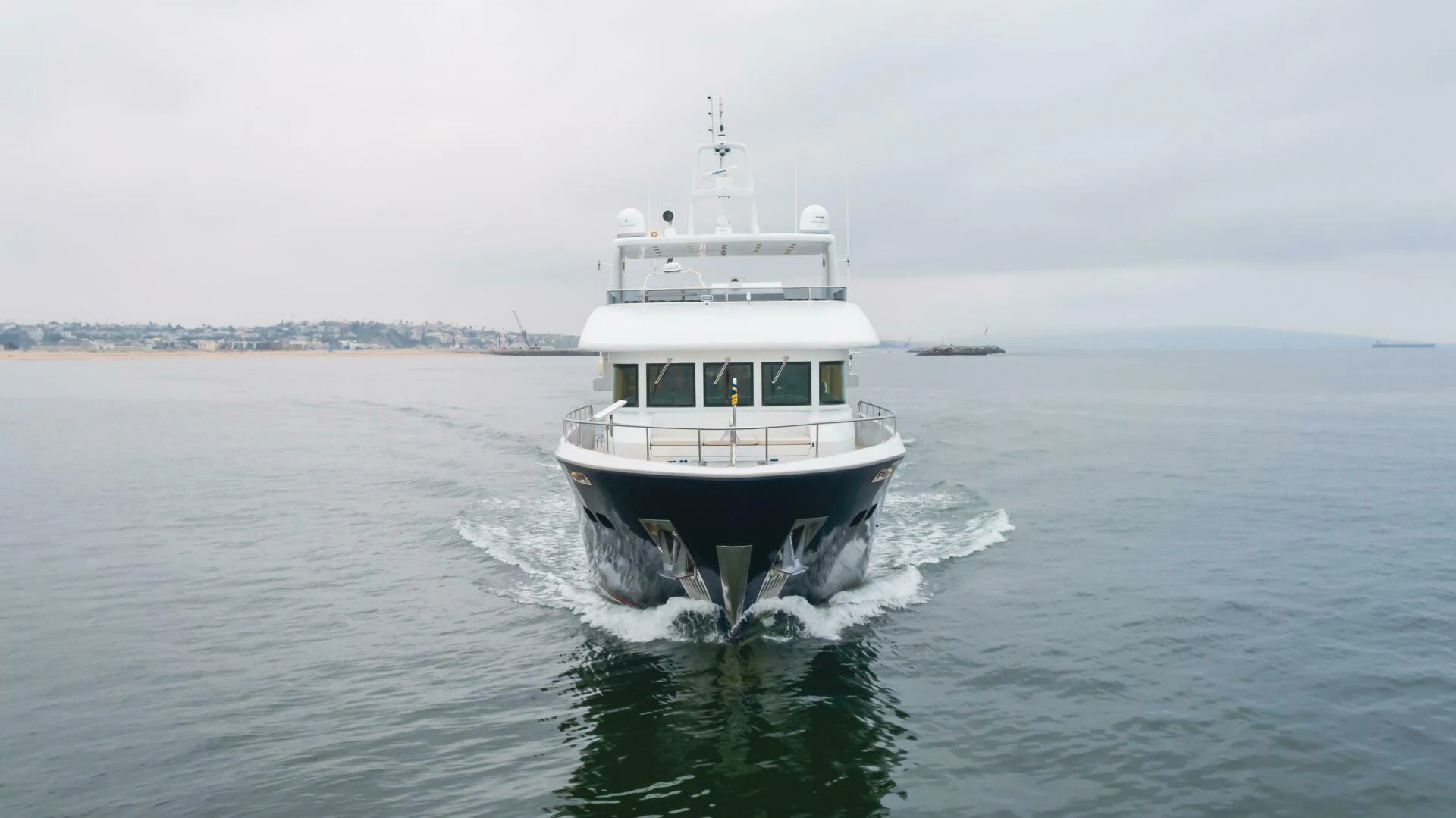 a boat on the water aboard UNDAUNTED Yacht for Sale