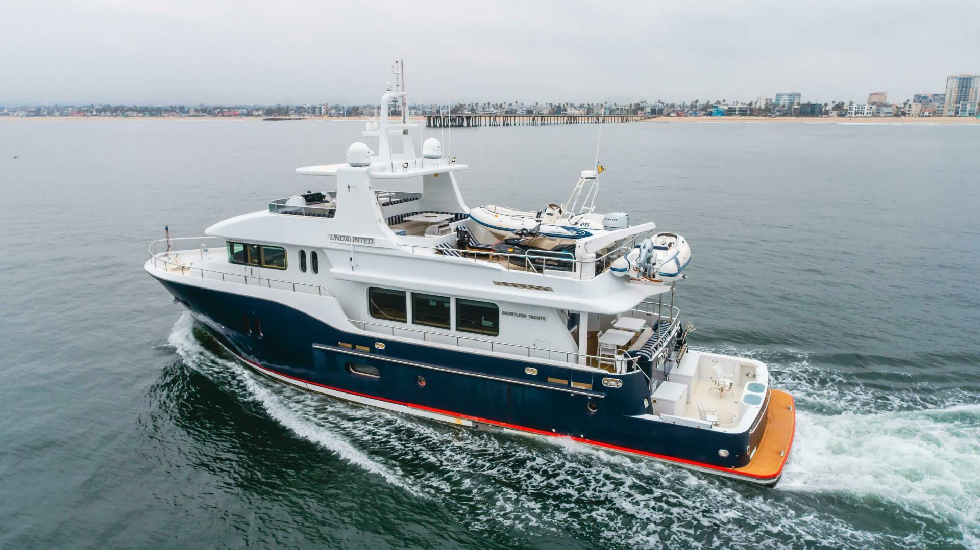 a boat on the water aboard UNDAUNTED Yacht for Sale