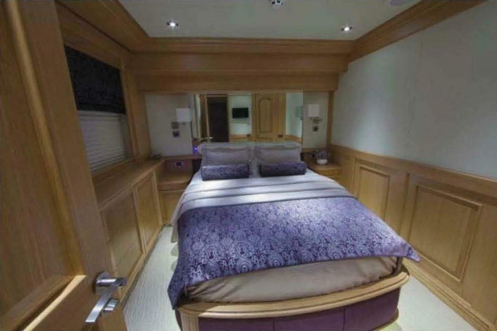 a bed in a room aboard UNDAUNTED Yacht for Sale