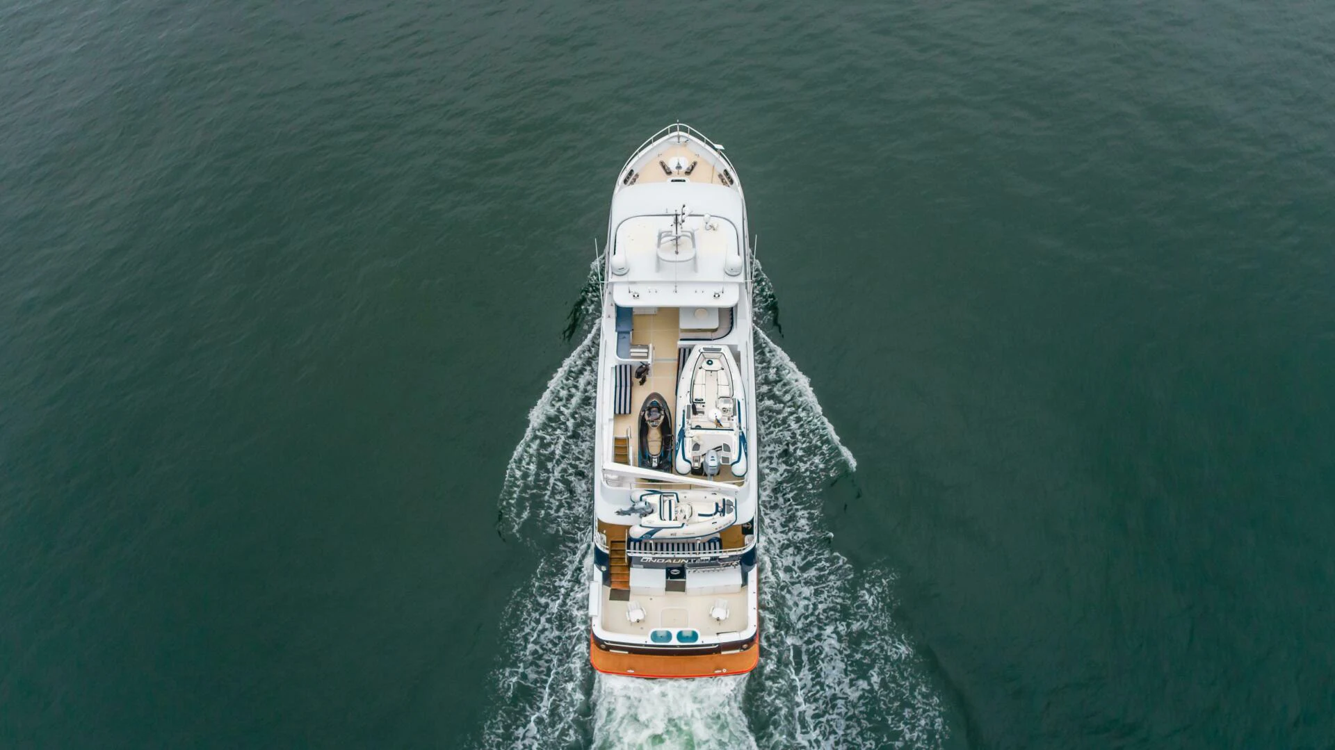 a ship in the water aboard UNDAUNTED Yacht for Sale