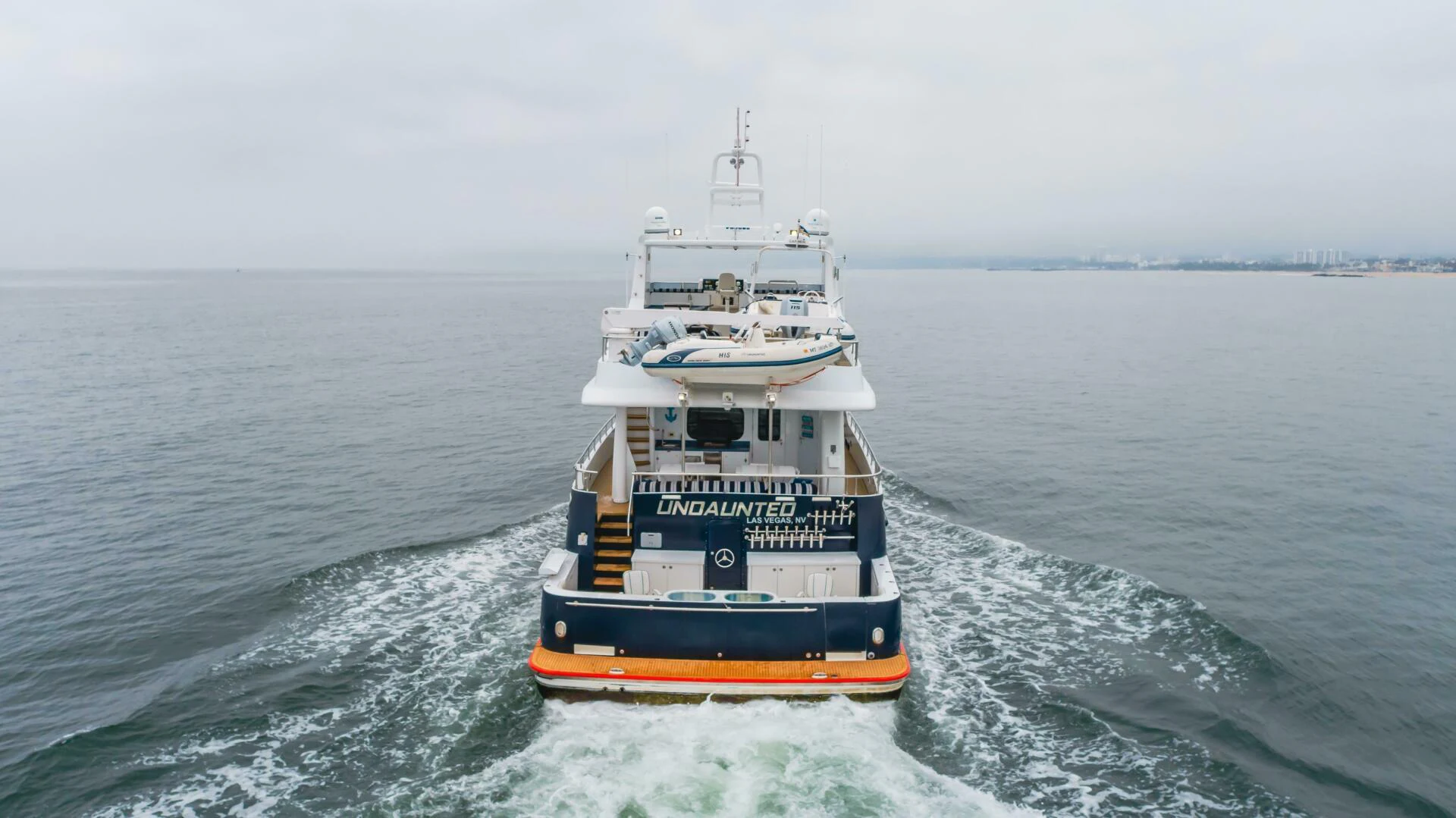 a boat in the water aboard UNDAUNTED Yacht for Sale