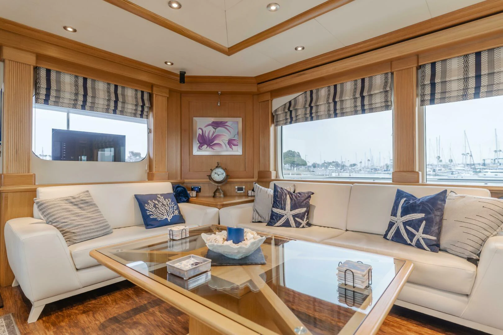a living room with a large window aboard UNDAUNTED Yacht for Sale