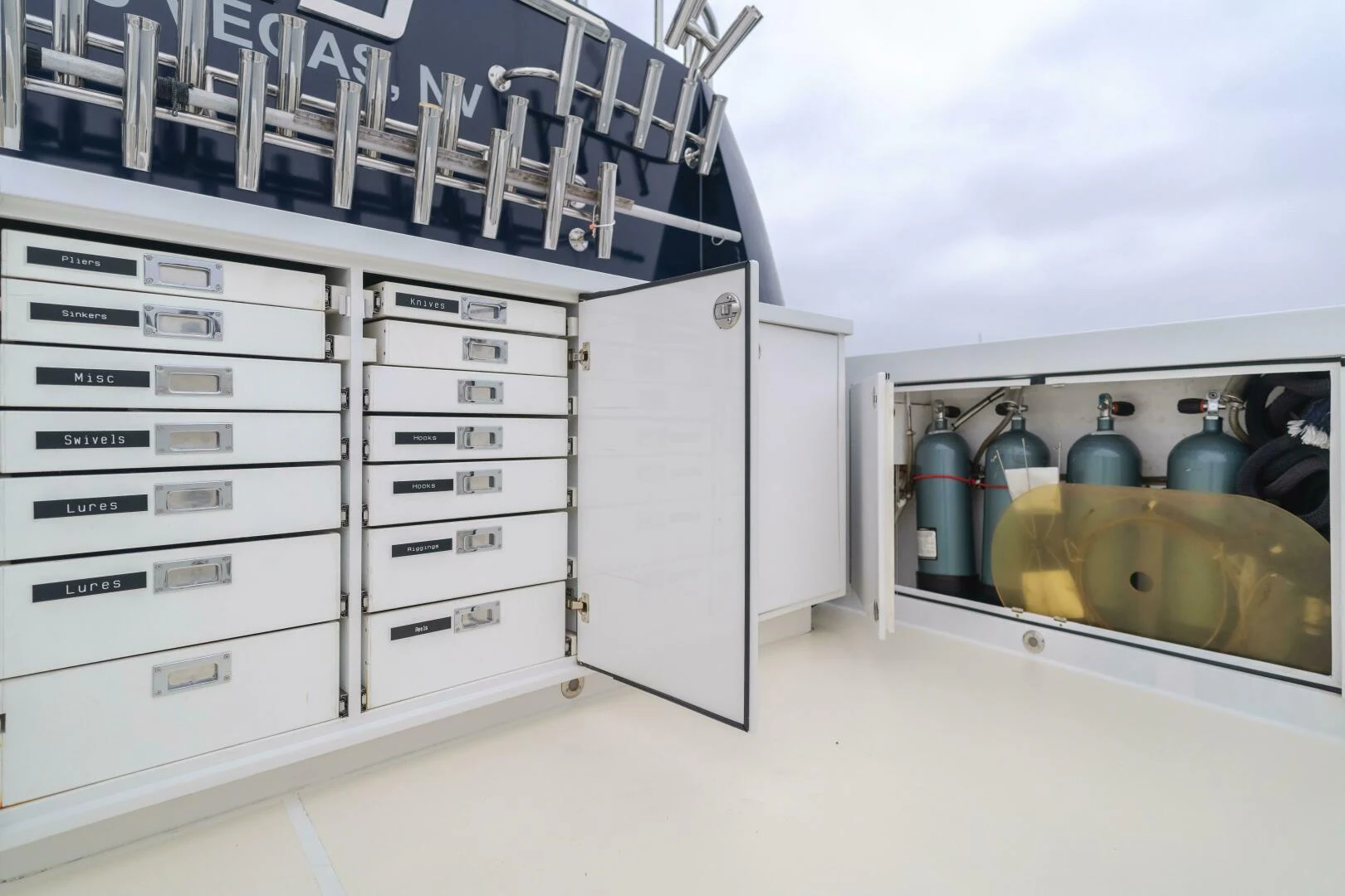 a room with a cabinet and shelves aboard UNDAUNTED Yacht for Sale