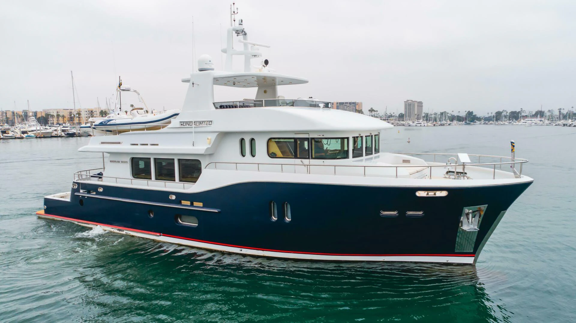a boat in the water aboard UNDAUNTED Yacht for Sale