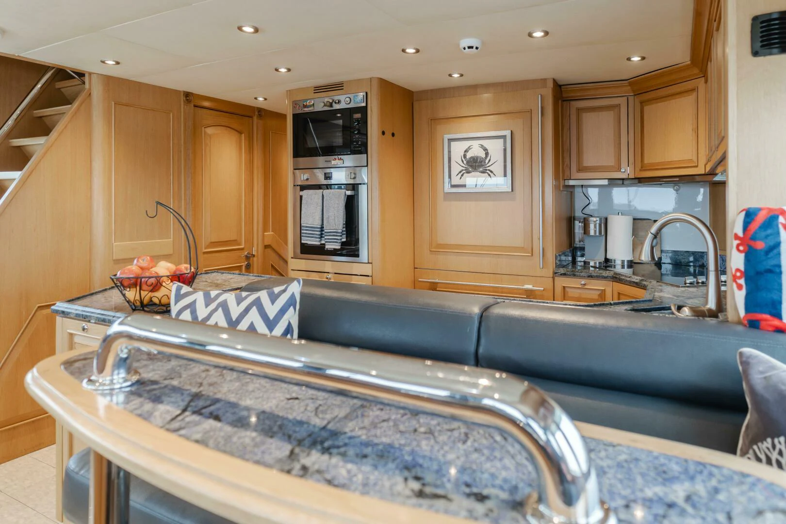 a kitchen with a large blue tub aboard UNDAUNTED Yacht for Sale