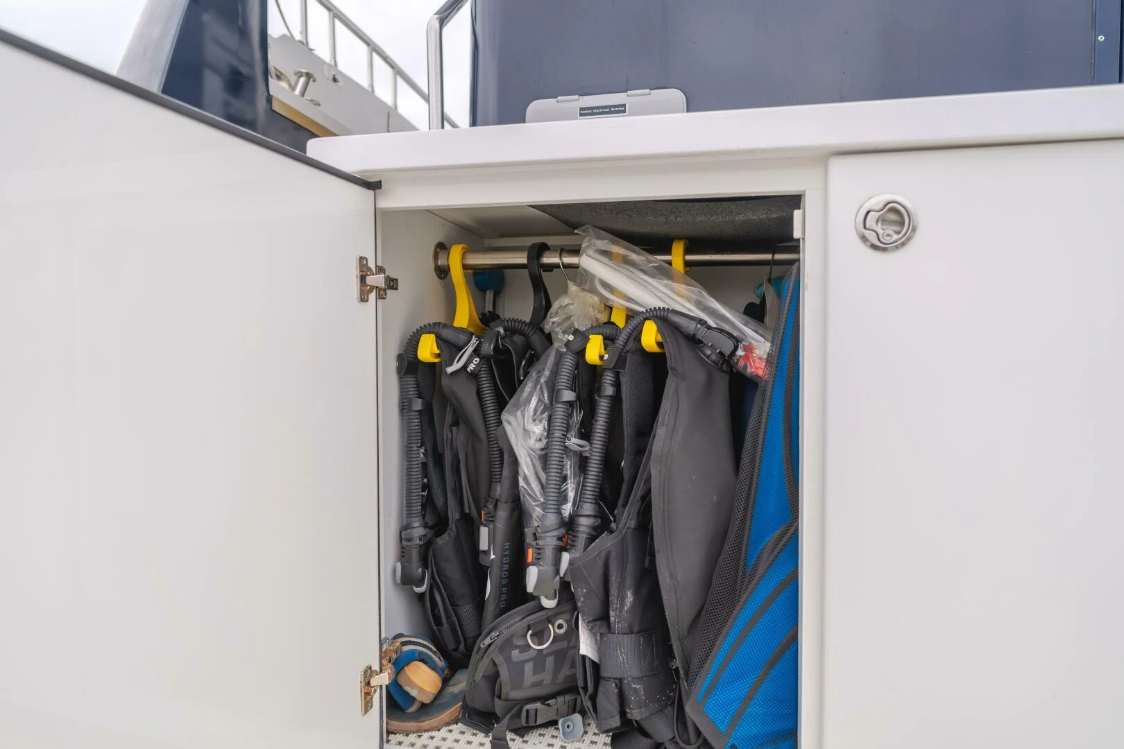 a closet full of clothes aboard UNDAUNTED Yacht for Sale