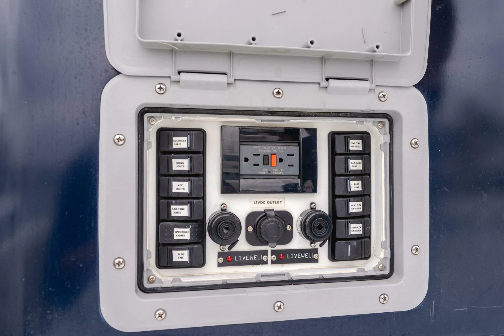 a white rectangular device with a black screen and buttons aboard UNDAUNTED Yacht for Sale