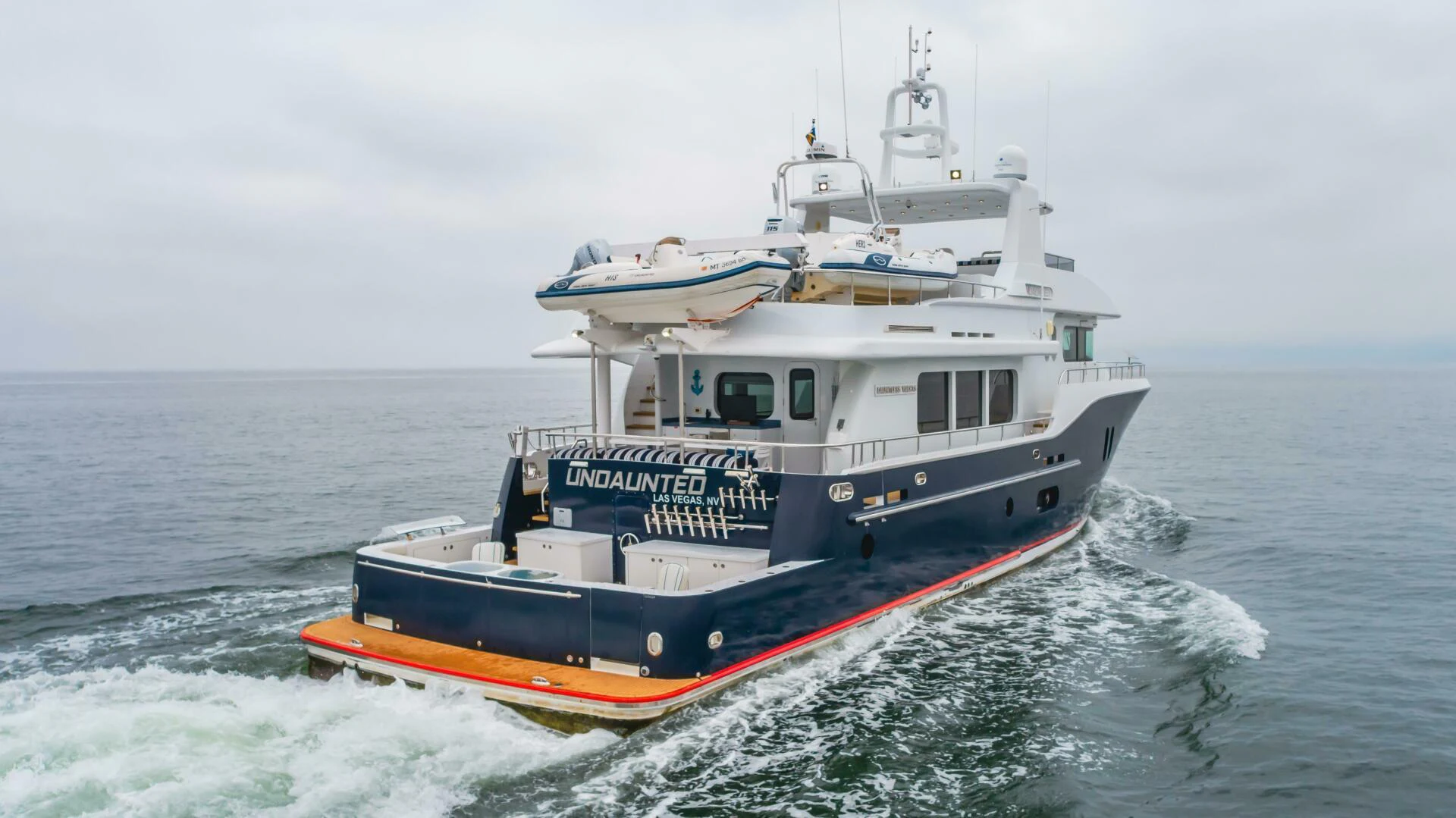 a boat in the water aboard UNDAUNTED Yacht for Sale
