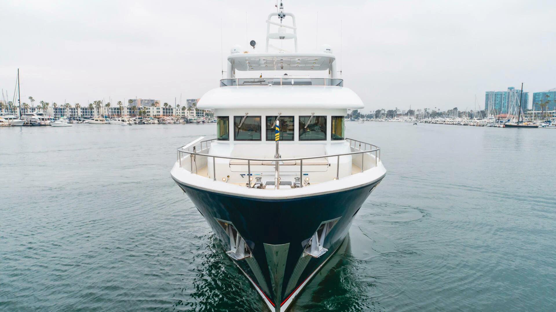 a large boat in the water aboard UNDAUNTED Yacht for Sale