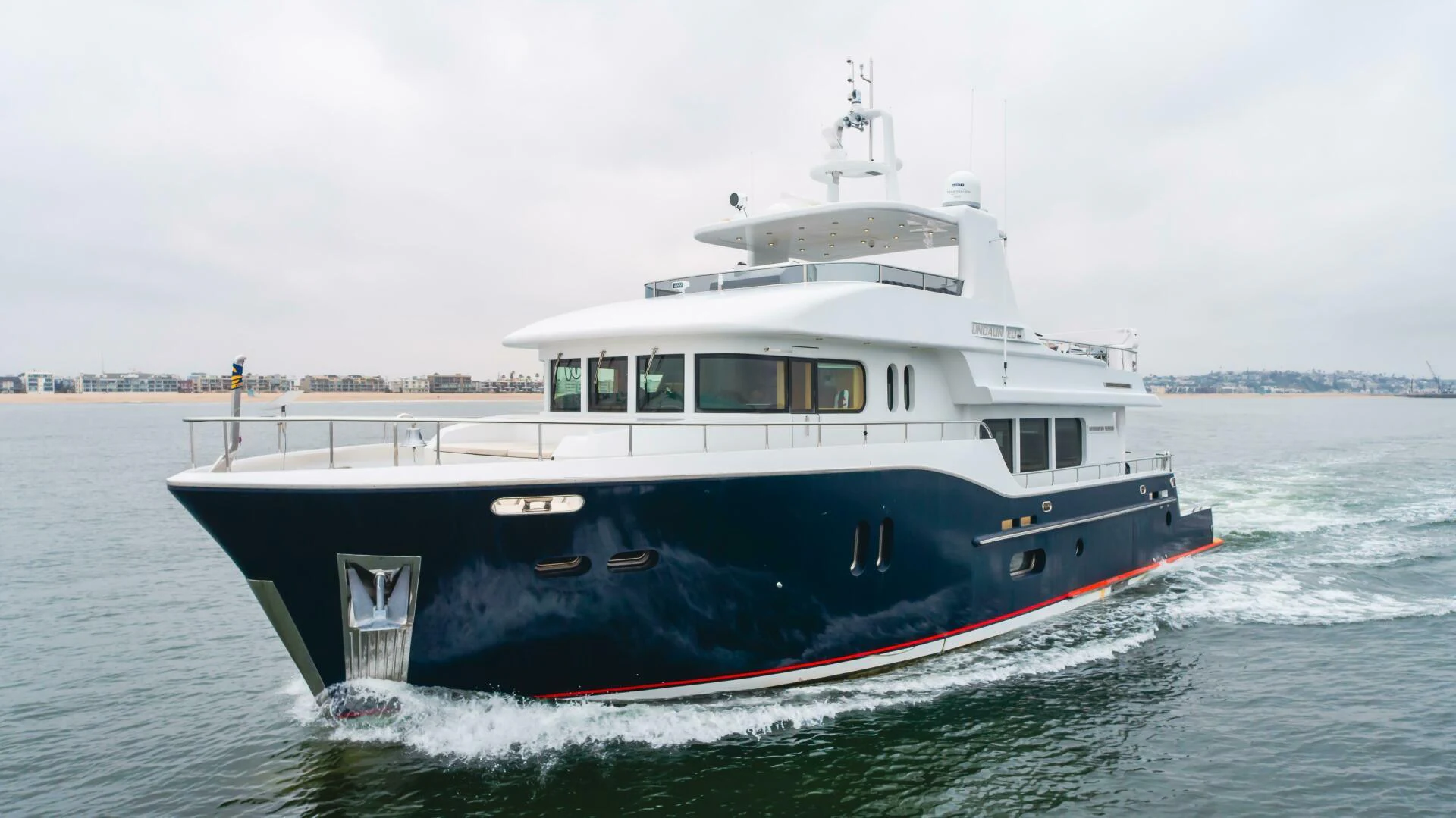 a boat on the water aboard UNDAUNTED Yacht for Sale