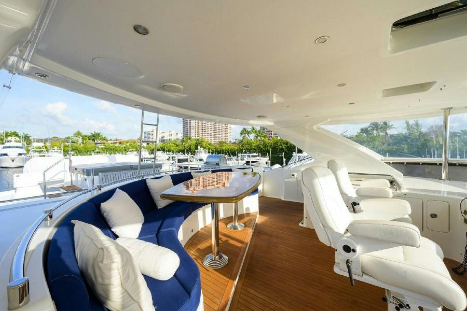a room with a table and chairs aboard BARNSTAR Yacht for Sale