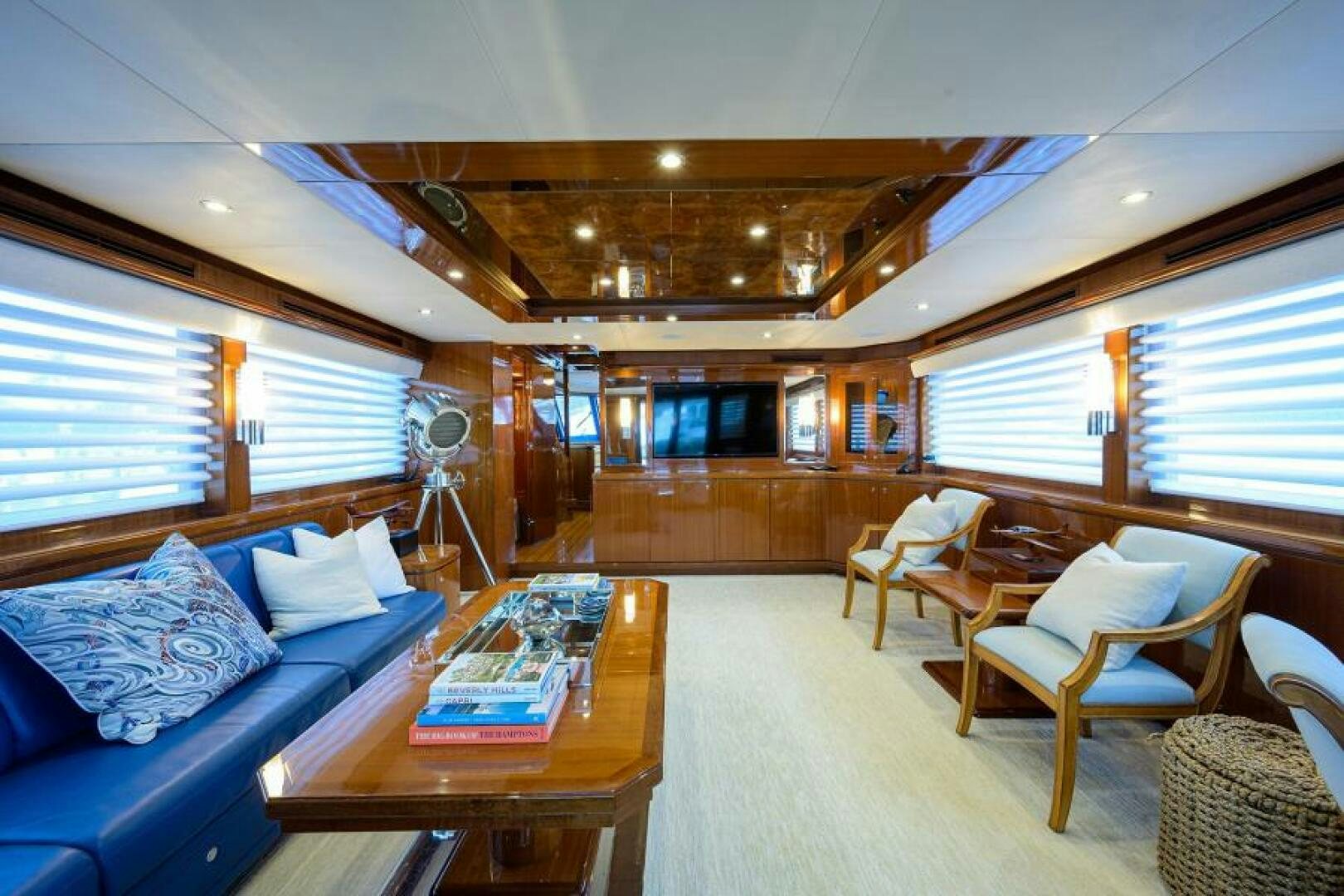 a living room with a couch and a table aboard BARNSTAR Yacht for Sale