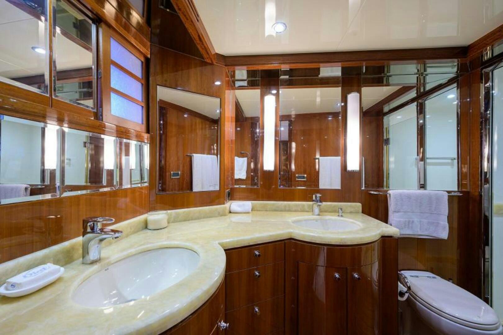a bathroom with a sink and a toilet aboard BARNSTAR Yacht for Sale