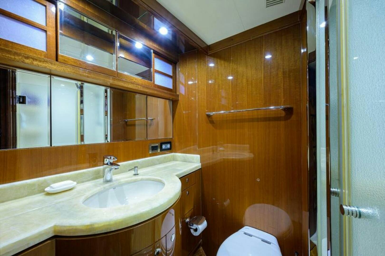 a bathroom with a sink and a toilet aboard BARNSTAR Yacht for Sale