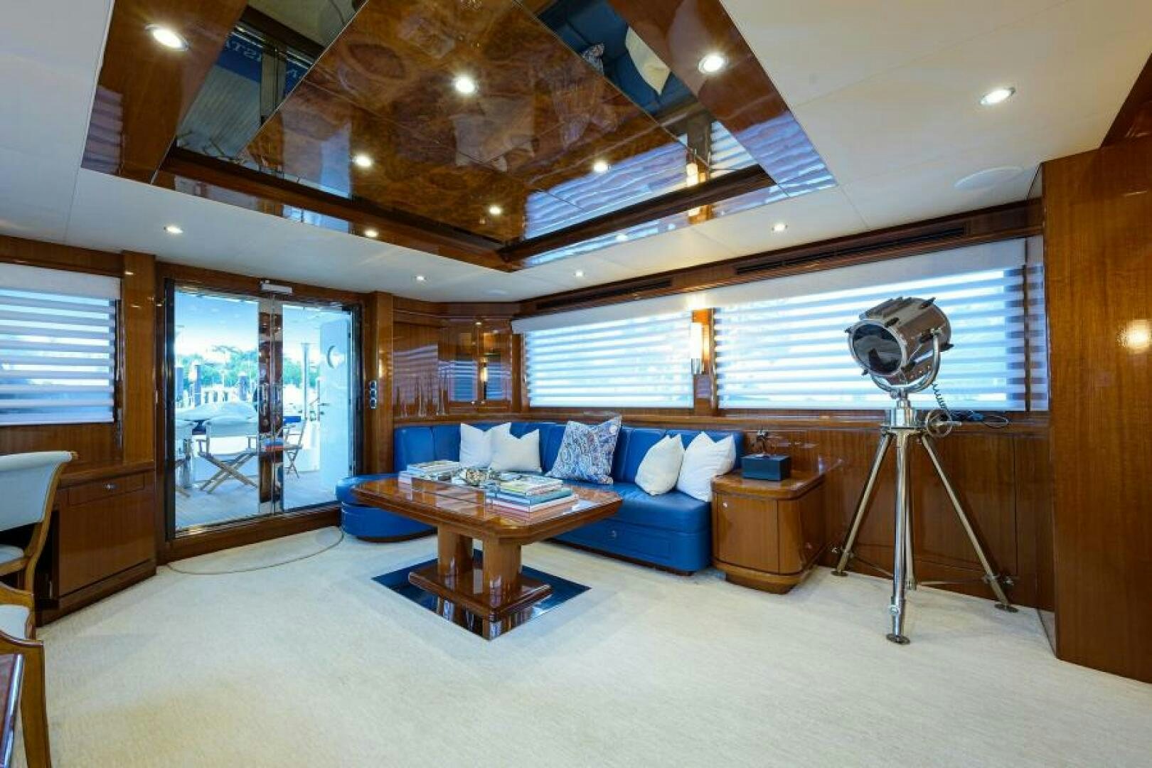 a living room with a couch and a fan aboard BARNSTAR Yacht for Sale