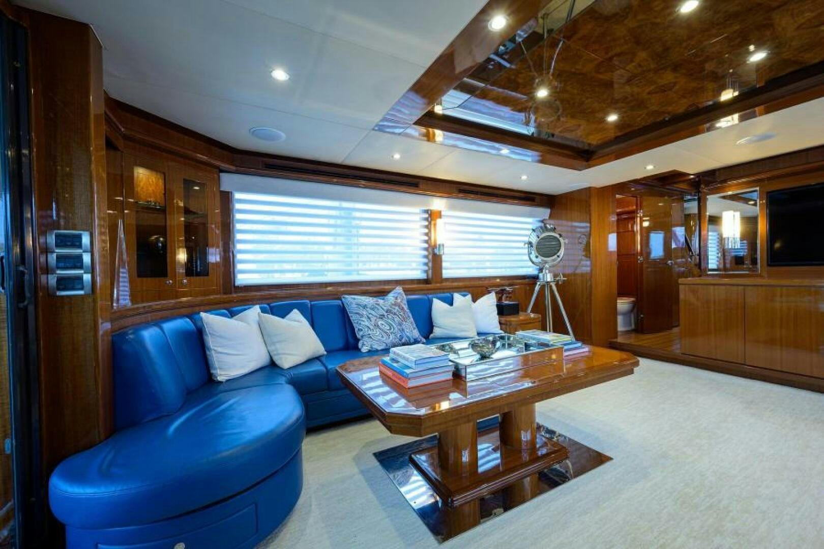 a living room with a couch and a table aboard BARNSTAR Yacht for Sale