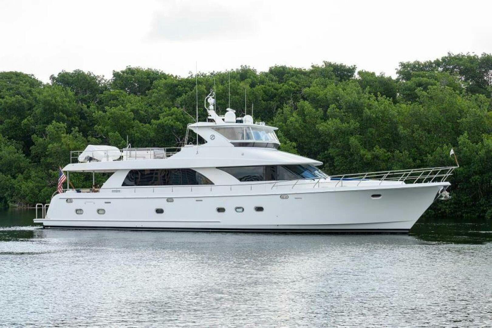a white yacht on the water aboard BARNSTAR Yacht for Sale