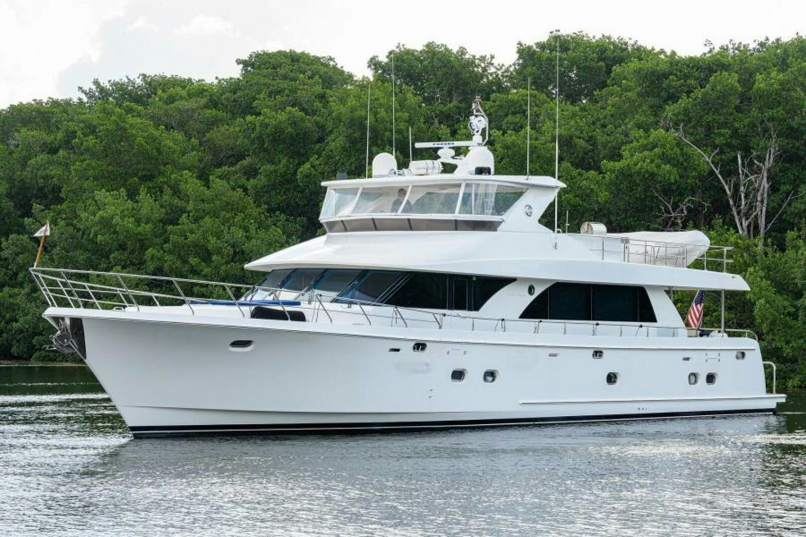 a white yacht on the water aboard BARNSTAR Yacht for Sale