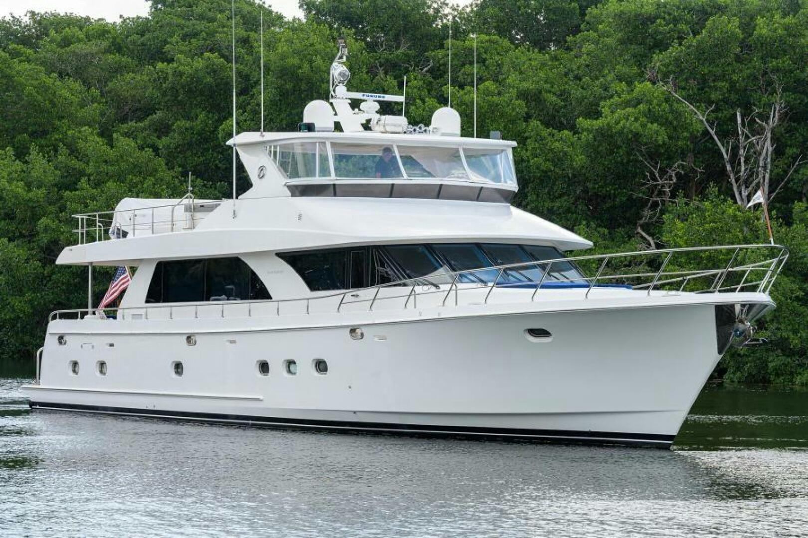 a white yacht on the water aboard BARNSTAR Yacht for Sale