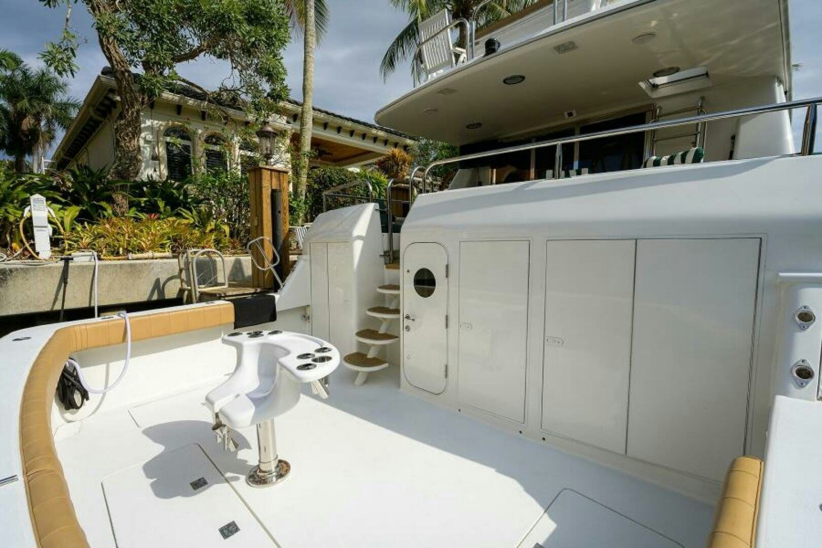 a white bathroom with a large white sink and a large white cabinet aboard 80' LAZZARA Yacht for Sale