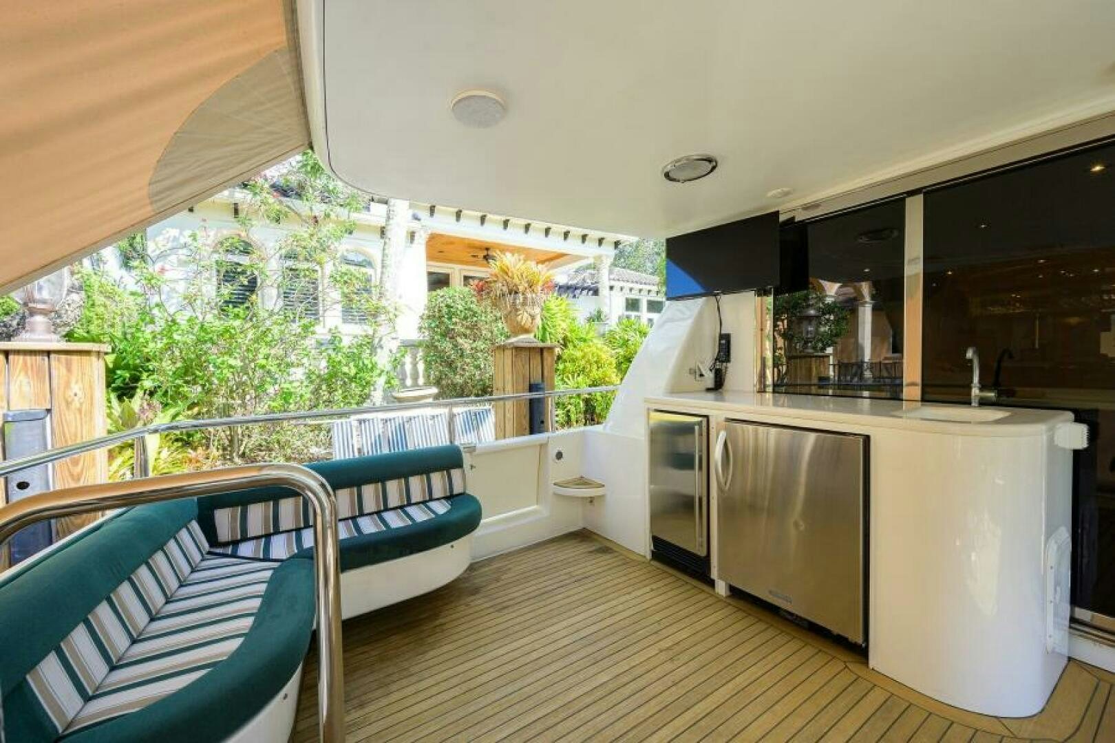 a large kitchen with a deck aboard 80' LAZZARA Yacht for Sale