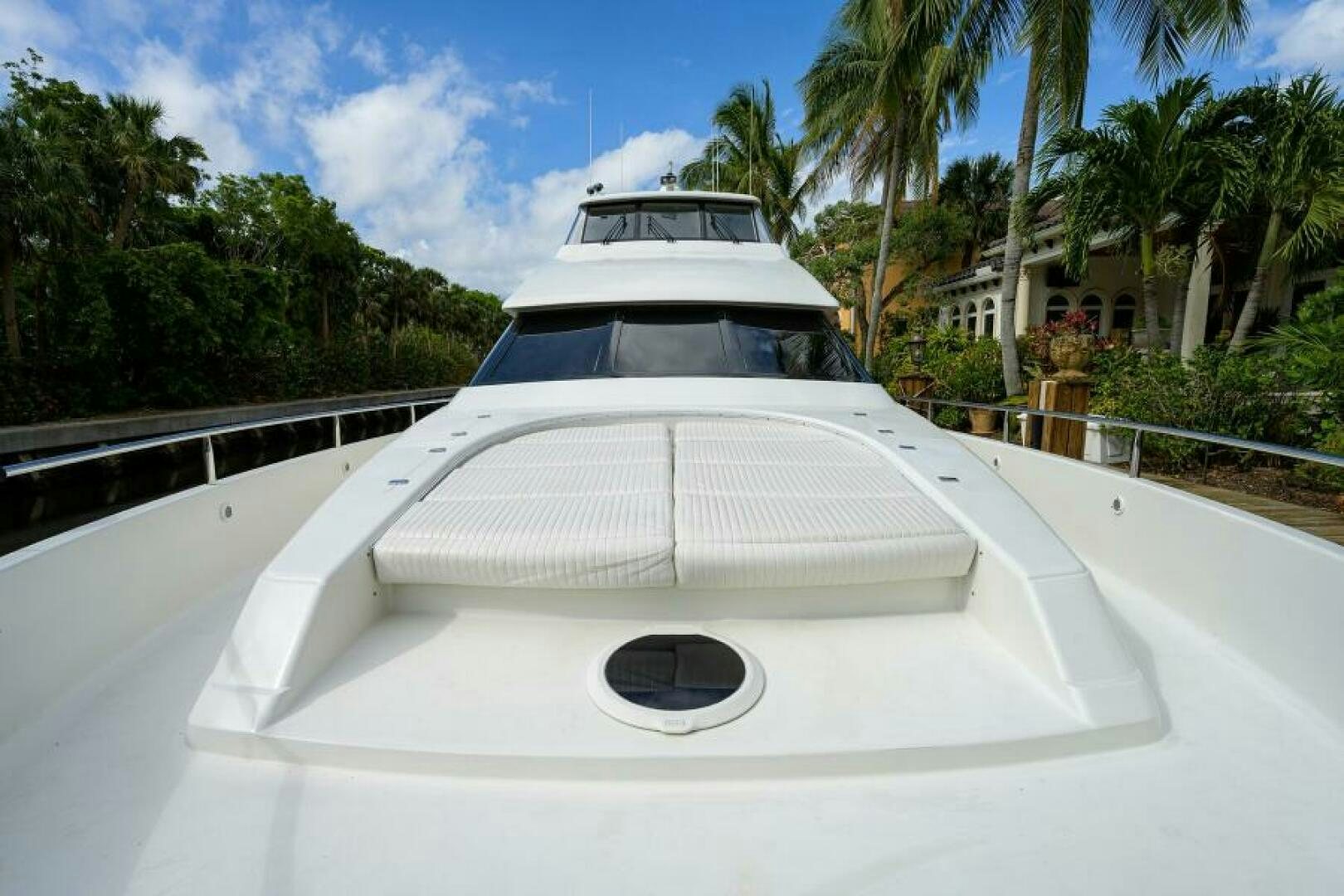 a white car with a round top aboard 80' LAZZARA Yacht for Sale