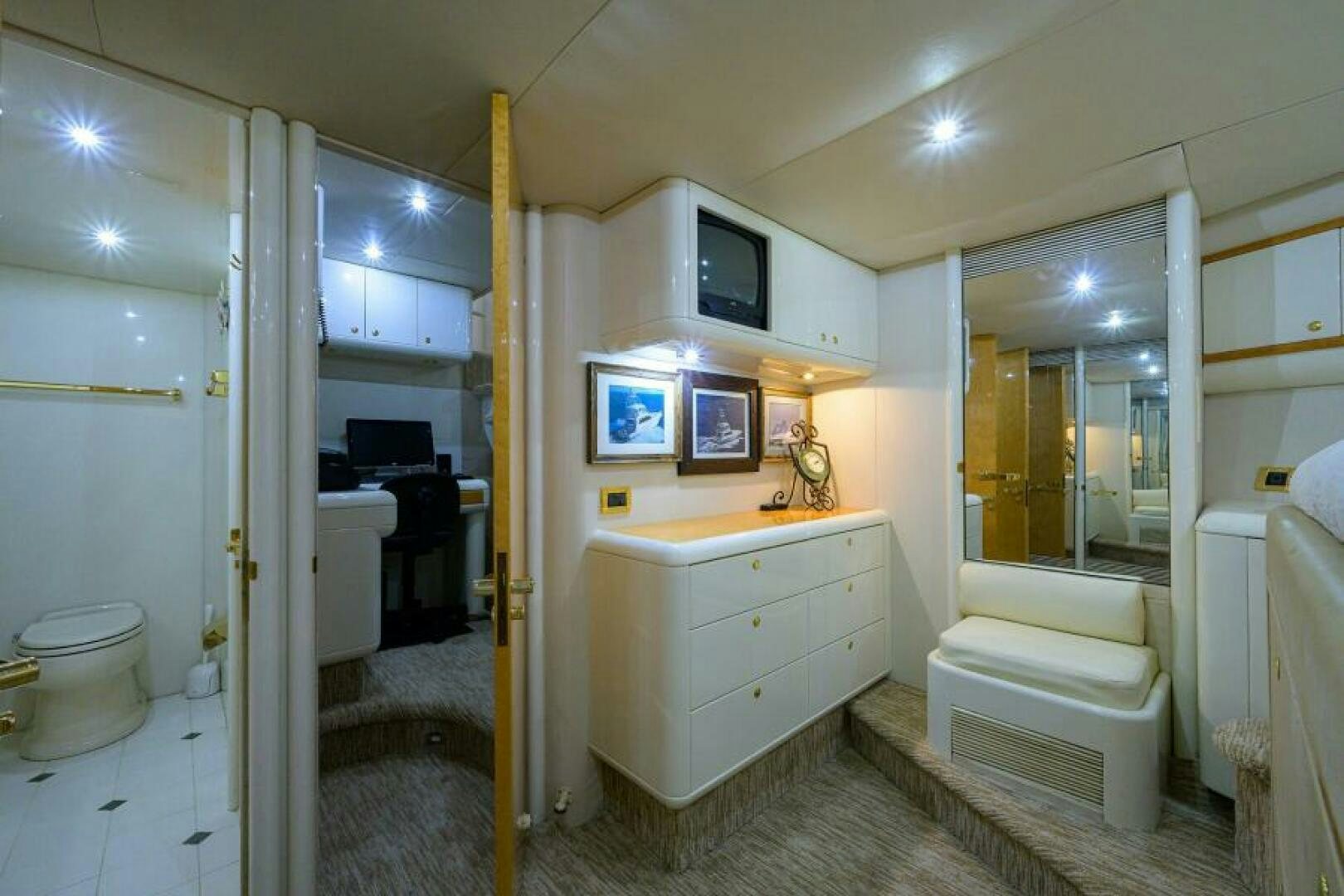 a bathroom with a sink and a mirror aboard 80' LAZZARA Yacht for Sale