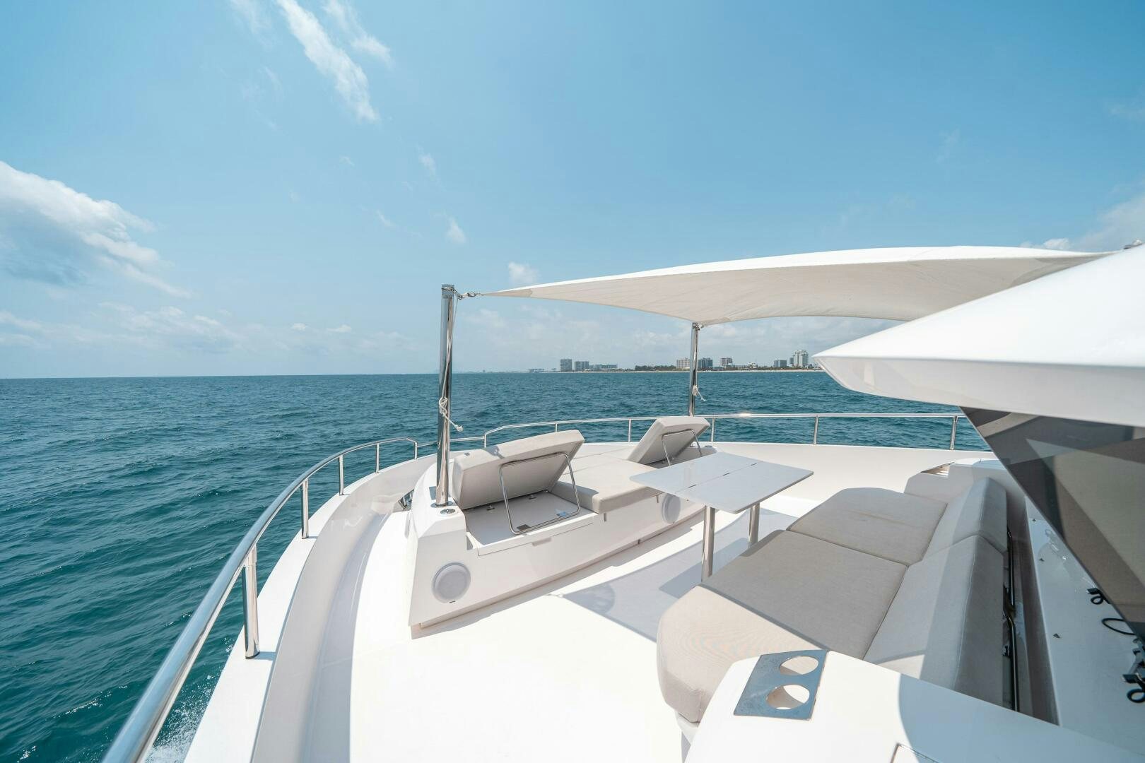 a boat on the water aboard AFTER MIDNIGHT Yacht for Sale