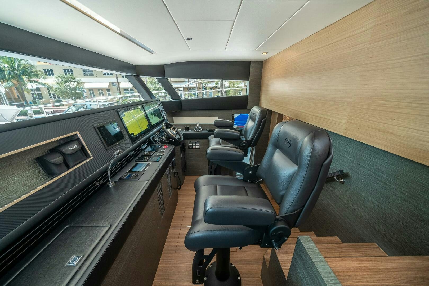 a room with a desk and chairs aboard AFTER MIDNIGHT Yacht for Sale