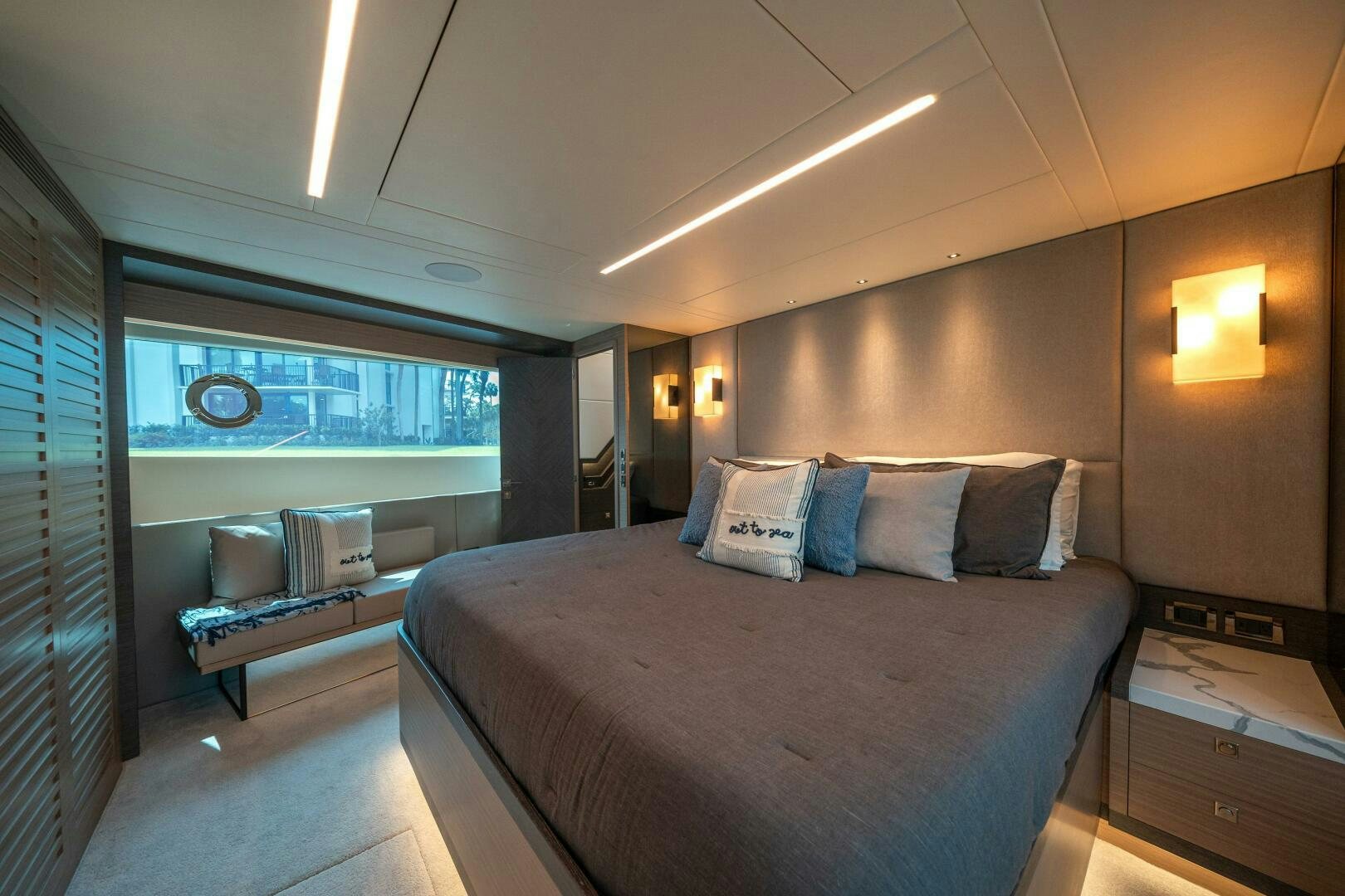 a bed in a room aboard AFTER MIDNIGHT Yacht for Sale