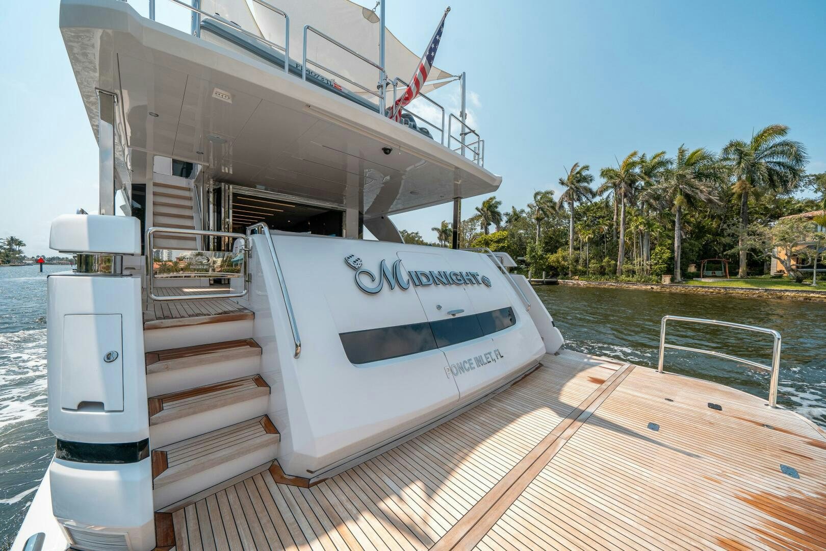 a boat on a dock aboard AFTER MIDNIGHT Yacht for Sale