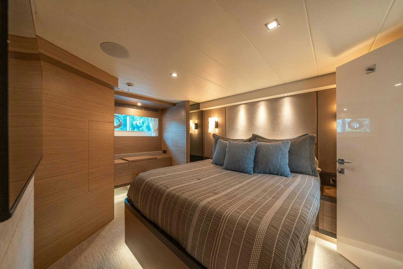 a bed in a room aboard AFTER MIDNIGHT Yacht for Sale