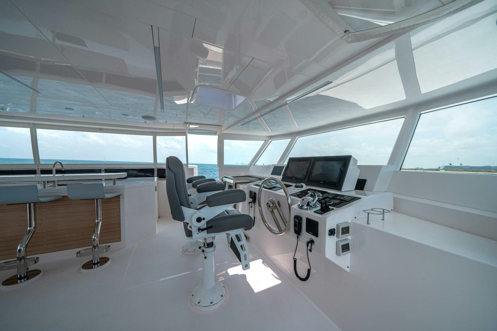 a room with a chair and a desk aboard AFTER MIDNIGHT Yacht for Sale