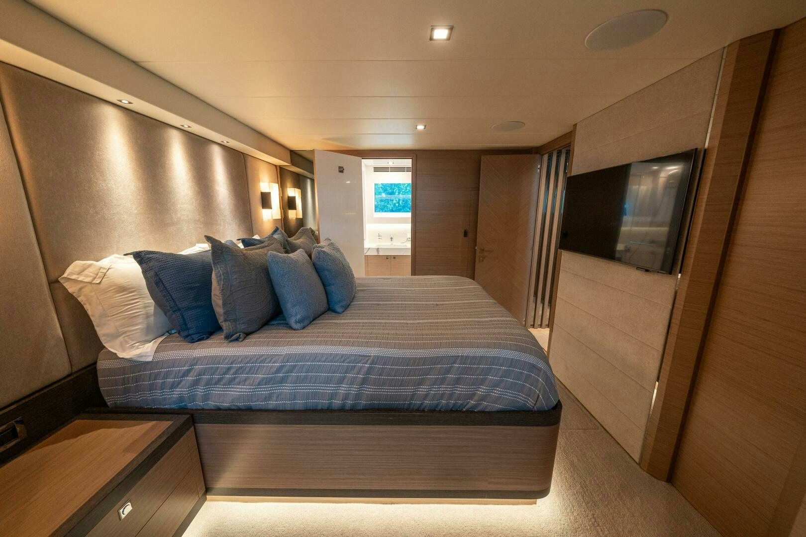 a bed in a room aboard AFTER MIDNIGHT Yacht for Sale